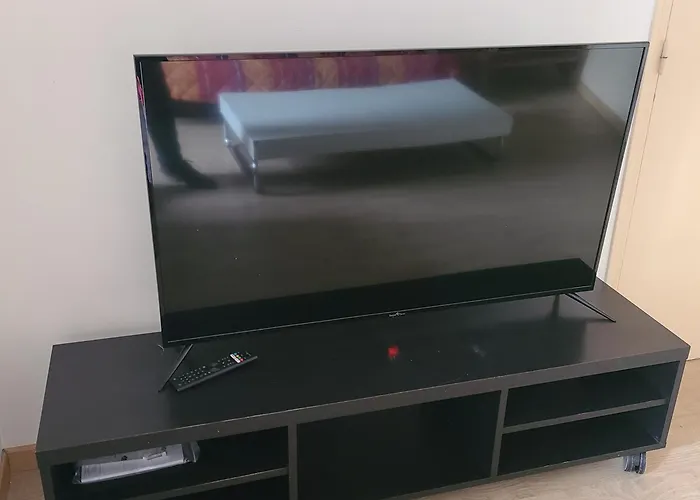 Duplex Pilier Rouge Avec Internet Et Tv Dans La Et Le Salon Apartman *